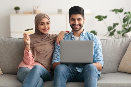 Australian homeowner reviewing loan documents online to decide whether to refinance their home loan.