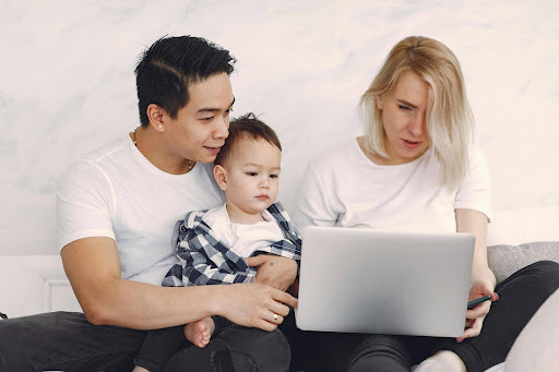 Family researching LMI exempt professions for home loans in Australia and mortgage insurance waiver options.
